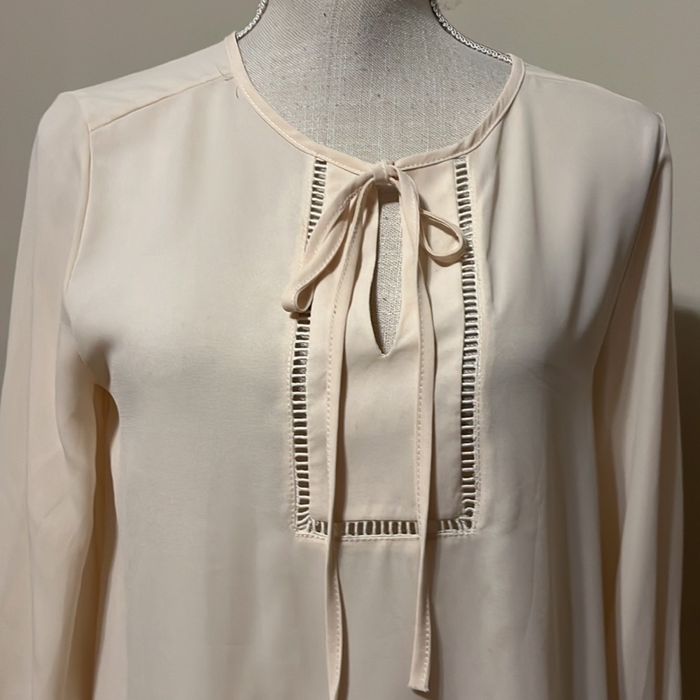 West Kei cream blouse, size sm/med